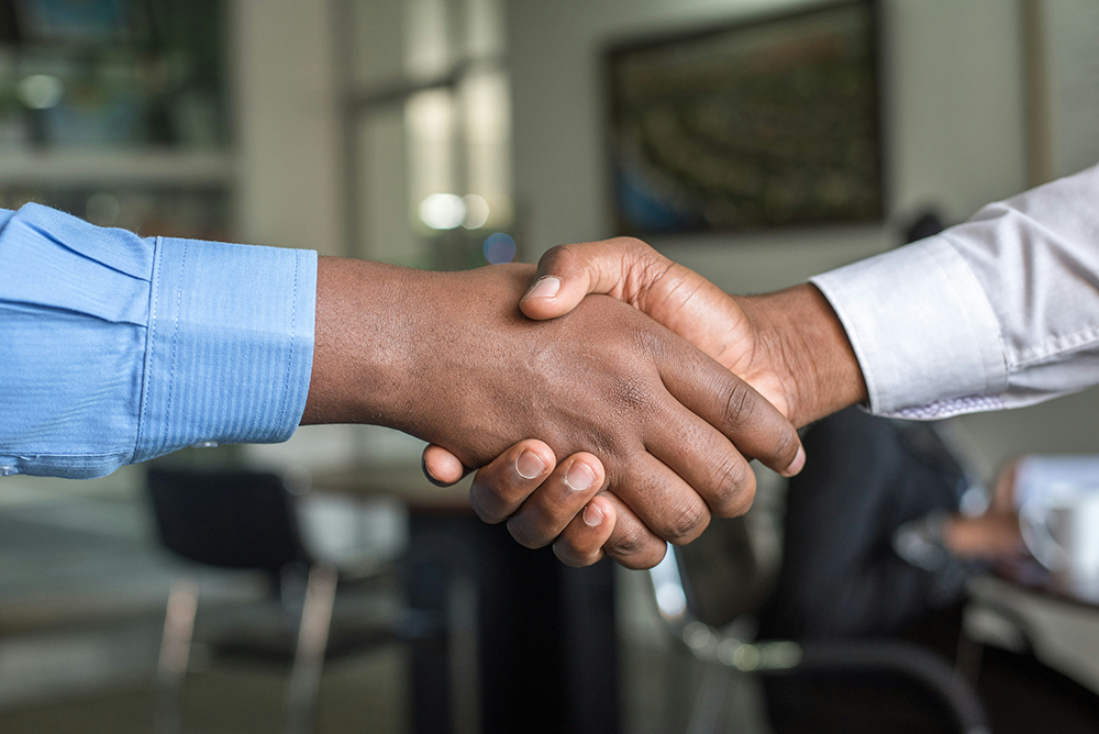 Händedruck, Symbol für Partnerschaft